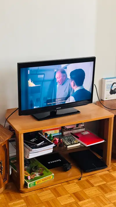 Samsung Flat Screen TV with Tv Stand, View more