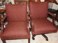 pair of vintage office chairs with new burgundy fabric