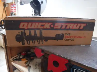 Monroe 172179L Front Suspension Strut and Coil Spring Assembly. In the box, never opened.