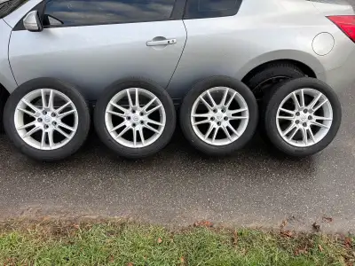 Selling a set of 4 Nissan Altima rims with tires on, taken off a coupe (bolt pattern is 5x114.3). Th...
