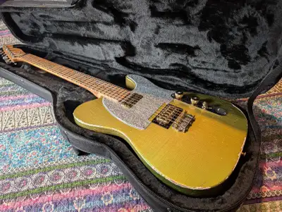 MJT Relic-finished electric guitar has a gold body with heavy checking and wear. Warmoth Roasted Map...