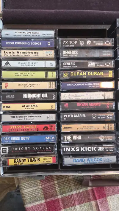 35 various country and rock cassettes. 30 homemade tapes.