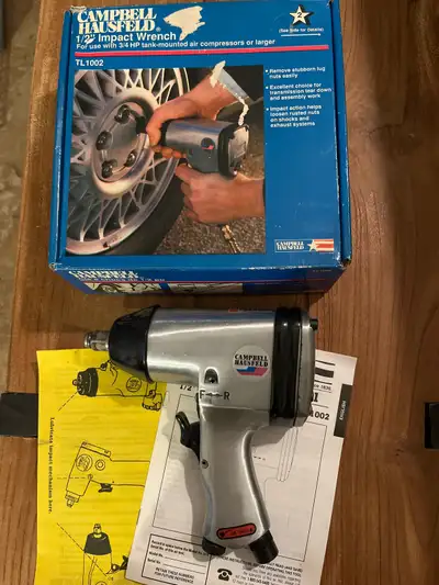 This is a Campbell Hausfeld 1/2" Impact Wrench, model TL1002, designed for use with 3+ HP tank-mount...