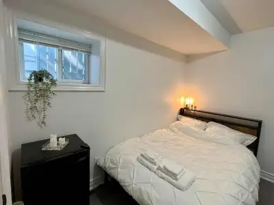 Ensuite Bedroom at Bathurst & Harbord St. Unit: Basement Bedroom with Bathroom and Closet attached,...