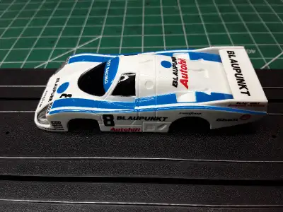 This is an extremely rare and hard to find Tomy AFX Lighted Blaupunkt Porsche #8 HO slot car body. R...