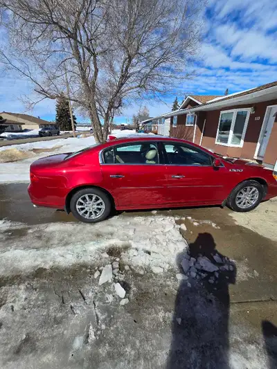 Used 2011 Buick Lucerne CXL red exterior tan interior 11,000 OBO contact Darren at 306-539-1747 grea...