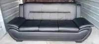 IN BOX: BRAND NEW BLACK LEATHER SOFA. FREE DELIVERY & DISPOSAL