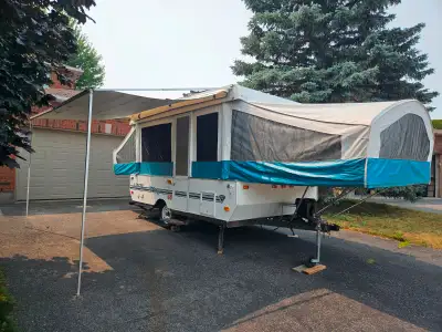 12 foot box - approx. 16 feet end to tongue Full length awning One king bed, one double bed Two tabl...