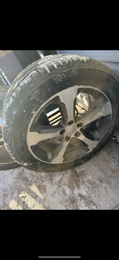 Rims and tires . Tires are brand new used less then two weeks . And are all season and bought at Kal...