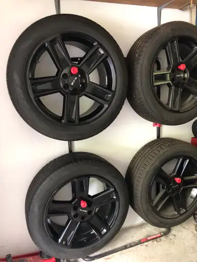 Brand new tires on black RTX rims. Rims in new condition. Comes with black wheel nuts and locks. 235...