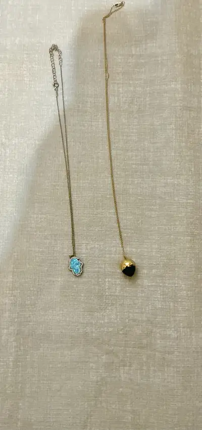 2 necklaces, one goldplated and one other, View more