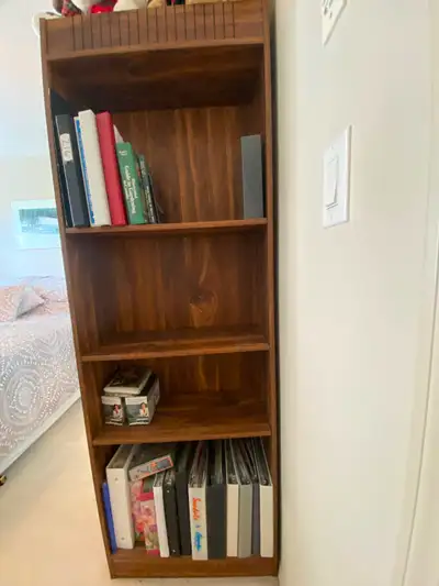 Organize your space with this sturdy wooden bookshelf, perfect for displaying your favorite books, b...