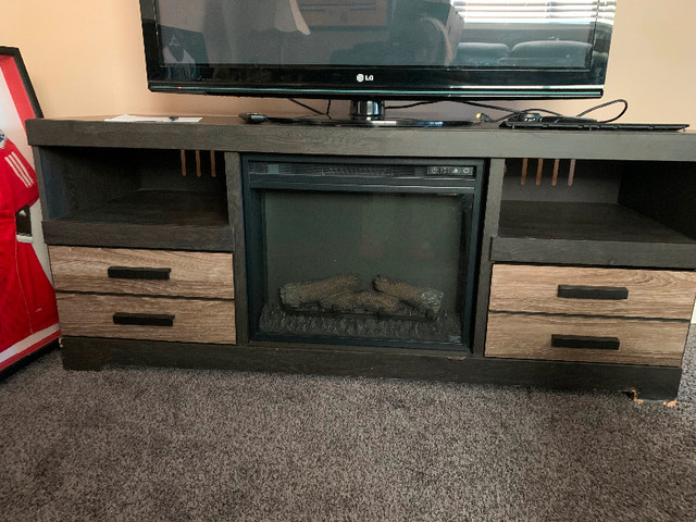 Tv stand with electric fireplace in TV Tables & Entertainment Units in Belleville