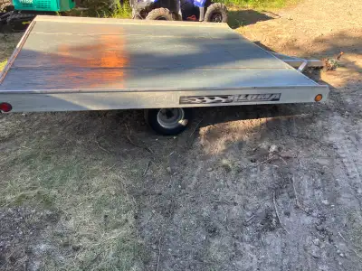 Aluma aluminum trailer with a tilting deck lightweight but very strong suitable for your moves or yo...