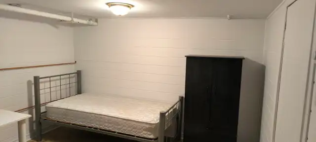 Furnished room for rent in the basement of duplex62863778374401123