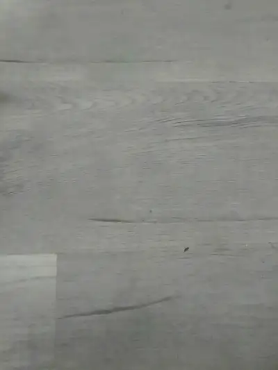 I am selling Seoul 5 mm loose lay / glue down grey vinyl plank color 4002 through my flooring busine...