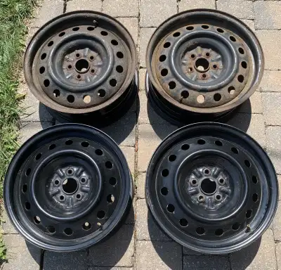 PRICE REDUCED !!! NOW ONLY $170 !!! Set of 4 steel rims with a 5x100 bolt pattern and a 16-inch diam...
