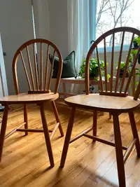 Two wooden dining chairs for sale