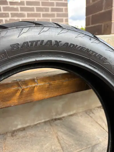 Bridgestone BattLax Adventure tire set. Front 100/90 R19, Rear 150/70 R17. Like new Dot 0823. Took t...