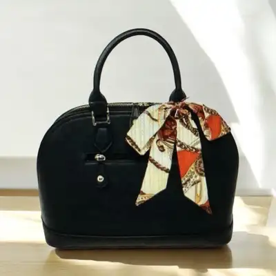 NEW stylish twilly satin scarf with a red, cream and brown pattern. Perfect for adding a pop of colo...