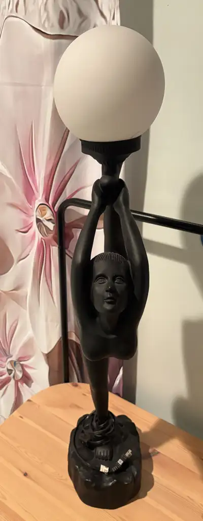 Add a touch of vintage elegance to your home with this striking ART Deco style table lamp, featuring...