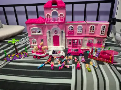 Barbie Dream Home Mega Bloks. Includes tons of accessories and characters. Has a working elevator to...