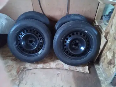 Rims are off a Ford Escape May get one winter off the ex-ice tires