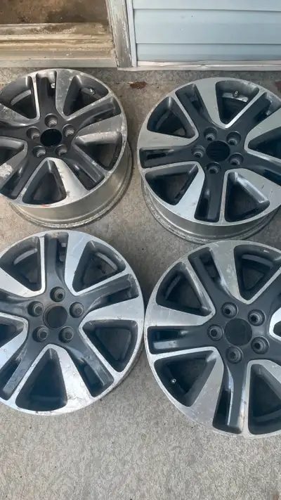 Four 18'' wheel rims, bolt pattern: 5x120. Asking $370 for four, obo.