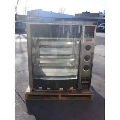 Hobart HR7 commercial rotisserie. Probably holds 20 chickens. Some roast pork and coffee in these. C...