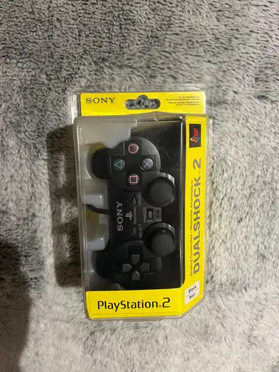 This a brand new in original packaging PlayStation 2 DualShock controller