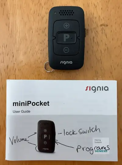 New Signia miniPocket Remote Control for hearing aid(s). Includes user guide and CR2450 3V battery (...