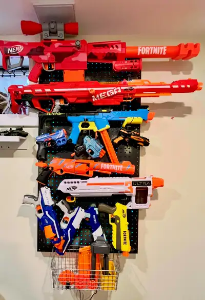 Selling my son's full Nerf collection — well-loved but in good working condition. Includes a custom...