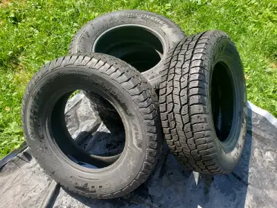 Selling a matching set of 4 premium Cooper Discoverer Snow Claw heavy-duty light truck winter tires....