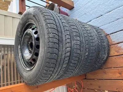 Michelin x-ice winter tires on steel rims 235/65R16 Used for 5 winters Set of 4 tires $400 (negotiab...