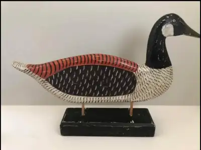 Old wooden hand carved hand painted goose decoration. Not sure of the age. Made in Indonesia.