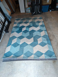 Surya 5' x 8' geometric pattern rug with anti-slip underlay