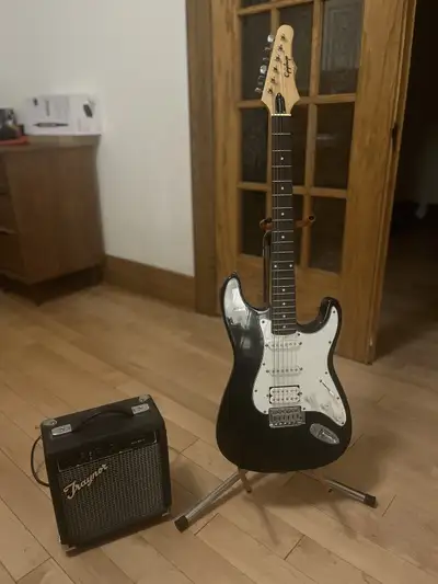 Electric Guitar and Traynor Amp, View more