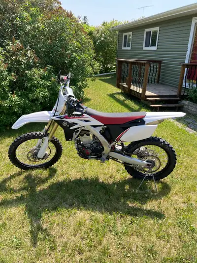 2012 YZ250F. Limited white plastics and red/black decal kit. . Factory. Matching seat. GYTR rad brac...