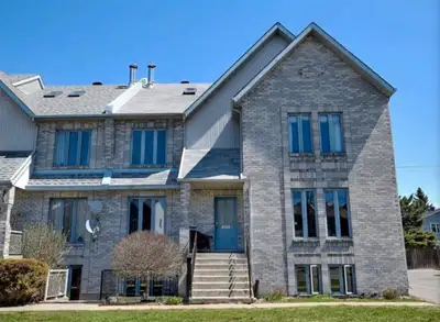 **Beautiful 5 1/2 with mezzanine on 3 levels . Town house style . Boasts 3 bedrooms 1.5 baths , wall...