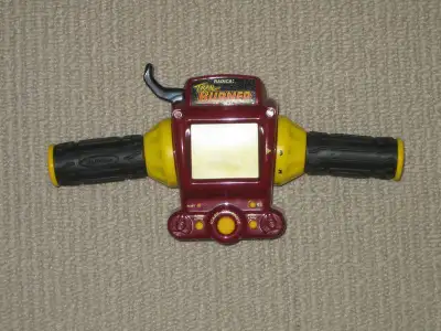 Radica: Trail Burner electronic handheld game, View more