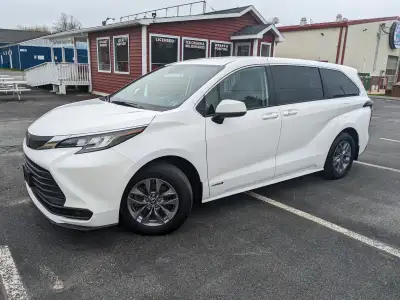 This EXTREMELY RARE 8-passenger Toyota Sienna was only driven for 5 months while we waited for our n...