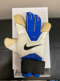 White and blue Nike soccer goalie gloves