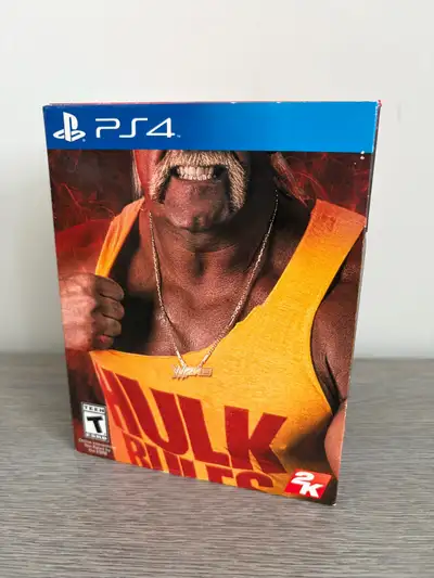 WWE 2K15 Hulkmania Edition for the PS4. New in box, big box seal broken but all contents inside new....