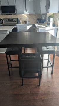 Bar table with extension leg. Stools not included