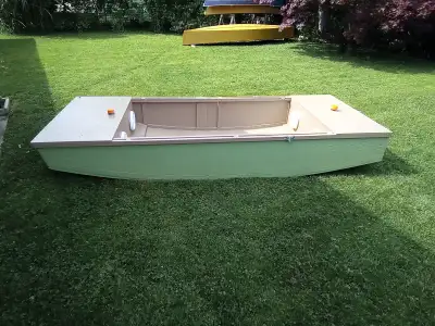 Multi functional utility boat, can be sailed, rowed, or powered with a small outboard. Comes with ru...
