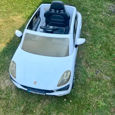 Porsche kids ride on power wheels car needs charger and battery , View more