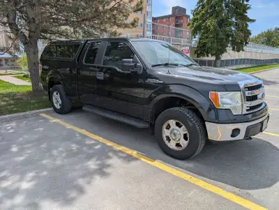 2014 Ford F150 XLT, 4WD, Extended Cab, 6.5 foot box, 3.7 L V6, 136 L fuel tank. Comes with Leer cap,...