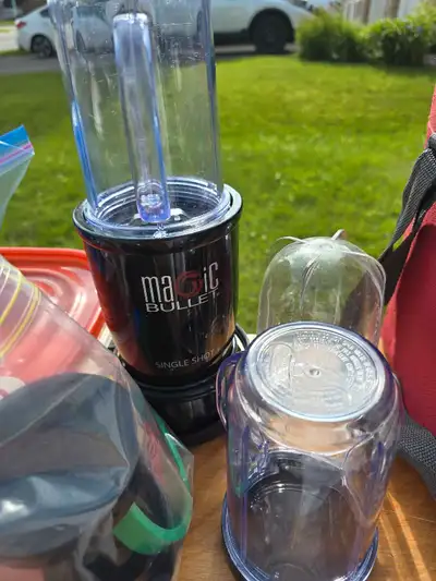 Magic Bullet w 3 cups and some lids, View more