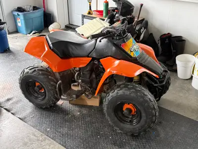This is a pre-owned Suzuki QuadSport youth ATV, designed for young riders looking for a reliable and...