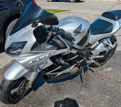 Rare black and silver CBR F4i. Only 33k km and lots of mods. Even has a lowering kit on it. Great co...